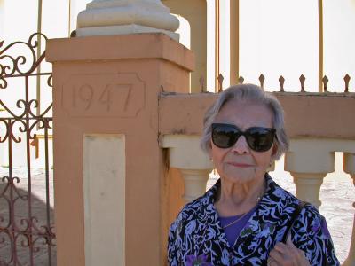 Here's mom in front of the church.  Seems that it was renovated 12 years AFTER her marriage.