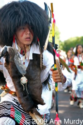 Buffalo dancer in Fiesta procession