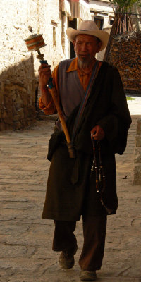 Pilgrim with prayer wheel