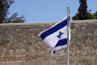 Israeli flag in front of the Western Wall