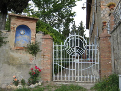 little relief sculpture and gate in san donato (G)