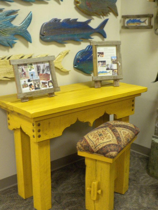 The writing table & bench with an about the artist display board