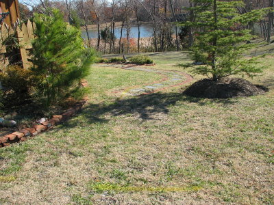 Out with the old - some of Gus' work must go, his slate/brick walkway to the deck