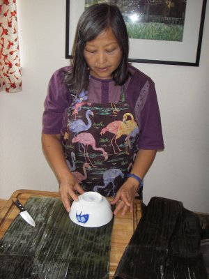 Use a bowl to cut banana leaf circles