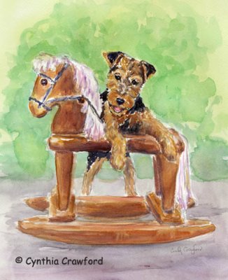 Welsh Terrier puppy and Rocking Horse