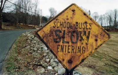 School Buses Slow Entering Suffield MA.jpg