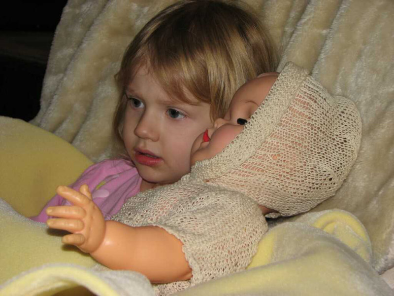 Morgan and her new doll.