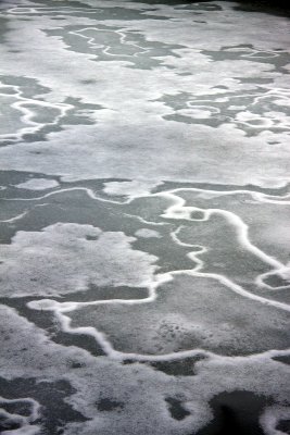 ice patterns on a frozen pond