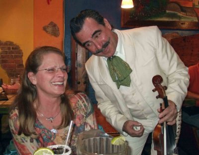 Marie is serenaded by a Mariachi at Pepper's in Port St. Joe