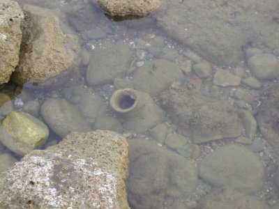 More pottery remnants could be seen in the shallows