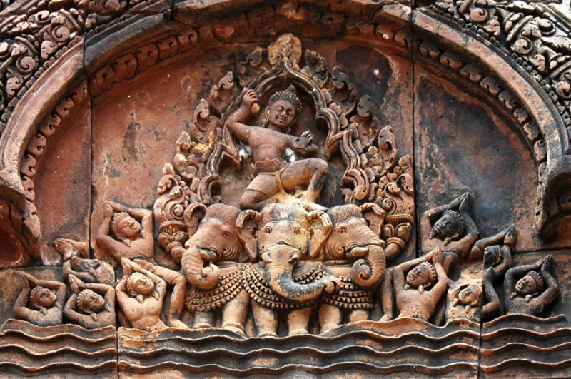 Indra, God of the Sky, riding his three-headed elephant Airavata and creating rain to put out a fire in the Khandava forest