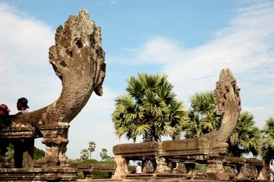 the balustrades of the causeway are in the form of nagas, their bodies raised on short square columns