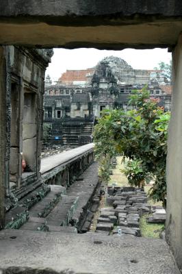 the collapsed pyramid behing the restored Gopura III E