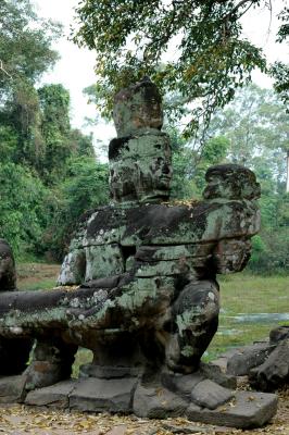 body of giant naga supported by gods and asuras