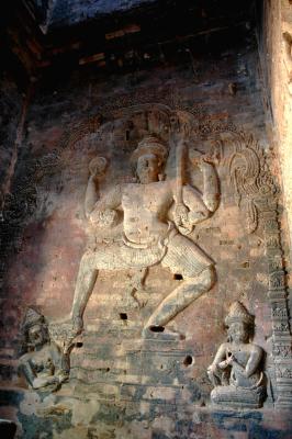 Vamana avatara, or Vishnu in the guise of a dwarf, stepping across th ocean, represented by three wavy lines below him