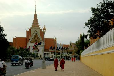 the high yellow walls of the Royal Palace