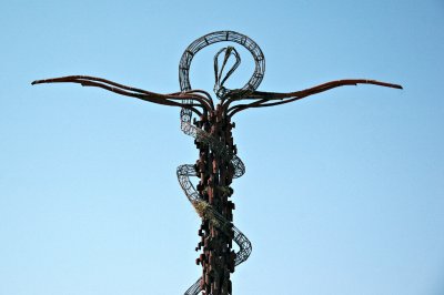 symbolises the suffering and death of Jesus on the cross and the serpent that Moses lifted up