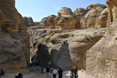 the Bab as-Siq - a narow passageway that cuts through the striking sandstone cliffs tinted rose, yellow and gray blue