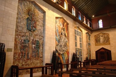 on the walls are a mix of artwork on mother-and-child-themed gifts domated by Catholic communities from around the world