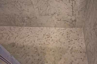 master bath floor - marble penny tiles