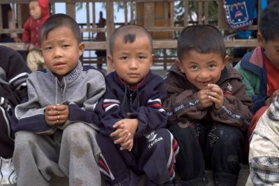 Boys of a minority ethnic group in Yunnan, China by Choi