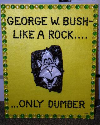 Lighted Sign:  George W Bush like a rock