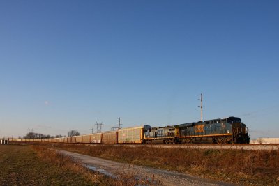 NB rack train stops to pick up cars (literally!) at Toyota