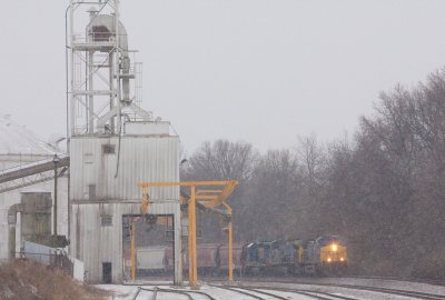 A snow squall moves through Princeton as NB train Q688 passes south Alliance