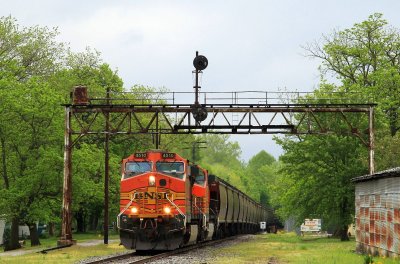 EVWR ran this BNSF grain train to Abengoa in Posey County and on this trip is returning the empty train to BNSF at Woodlawn. The weather was horrible, but the allure of bright orange on EVWR got us out of the house and up for the chase.
The first shot was here at the old signal tower where L&N met NYC/IC in Carmi