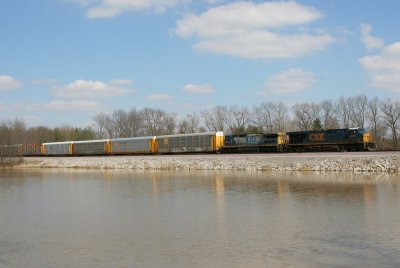 A UP rack and stack train leaves out of the south end of their yard at Salem. The train will meet a NB before departing.