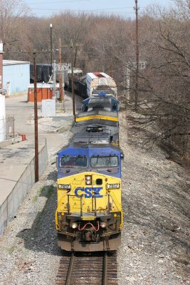 Q645 pulls south right behind the stack train.