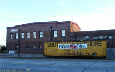 Milwaukee Road, Freight House & South Shore Boxcar, Davenport, Iowa.jpg