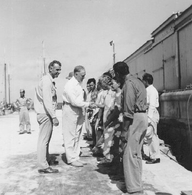 HiCom Midkiff  greets people Ebeye 1950