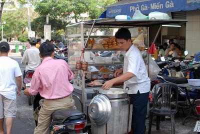 Street vendor w/ steamed buns, Saigon