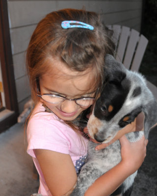 Isabella holding the puppy