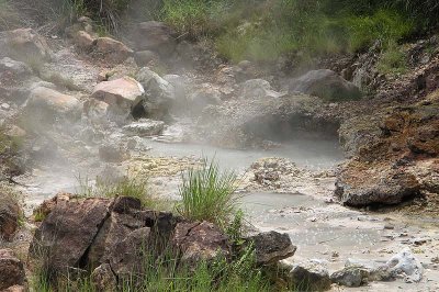 Steaming hot mud fumarole