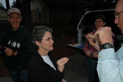 Fred shows Jody how to hold a hummer