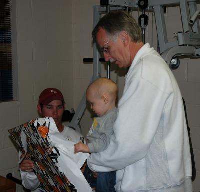 Steve and Brooks open a present