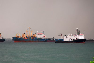 Cargo ships anchored off Sentosa Island