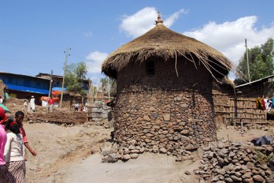 A round stone thatched hut typical of Lalibela