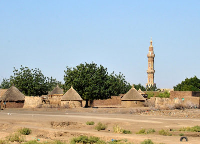 Minaret in a village that is a combination of rondavels and the more typical houses weve seen all over northern Sudan