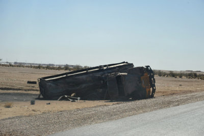 Burned out tanker truck along the main desert road to Khartoum