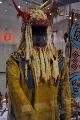 Horned bonnet of weasel skins and ceremonial shirt, Blackfoot ca 1880 & 1900