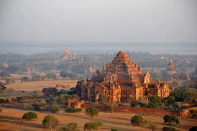Aerial view of Dhammayangyi Temple with Ananda Phaya and Old Bagan in the background