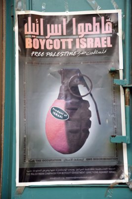 Boycott Israel poster with Israeli-grown orange as a hand grenade