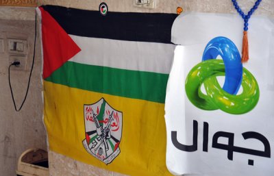 Yellow flag of al-Asifah (The Storm) with a Palestinian flag, Bethlehem
