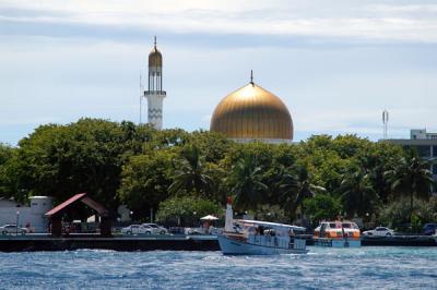 The Grand Friday Mosque at the Islamic Center is Males most dominant building with its gold dome