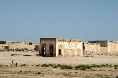 An old traditional house lying abandoned outside Al Khor