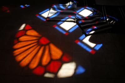 Light shining through the colorful windows on to the floor, Khan-e Tabatabei, Kashan, Iran