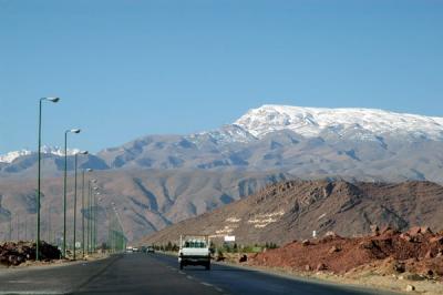 Snow covered Shir Kuh (Lion Mountain - 4075m) in the mountains just outside Yazd heading for Shiraz